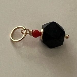 Genuine Azabache 6mm to 5 1/5 with coral 14k